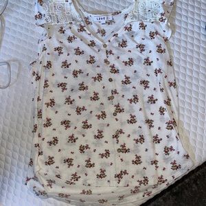 Size large Love J brand white shirt with red flowers brown buttons in front.